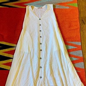 A white dress and a floral dress